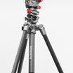 A high-angle studio shot of a Rogeti nesting tripod, RG-1 gear head, and GZA panning head set against a light gray gradient background.
